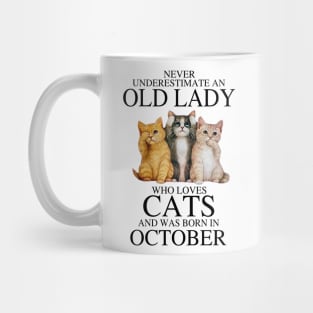 Never Underestimate An Old Lady Who Loves Cats October Mug